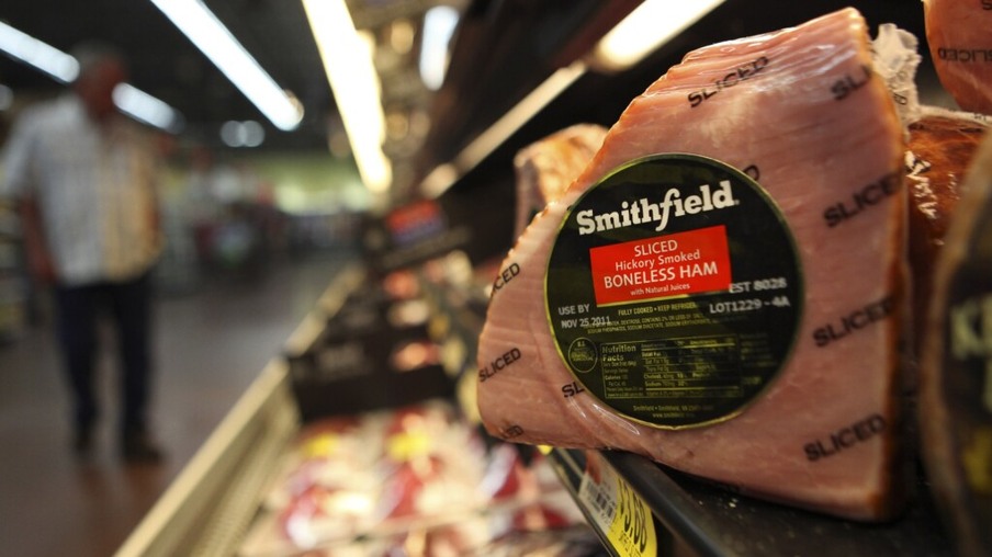 Smithfield Foods, makers of ham products under a variety of brand names, is being purchased by Chinese food maker Shuanghui International, for $4.72 billion in cash