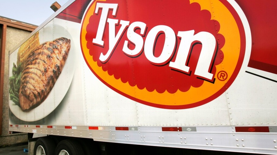 In this photo made Wednesday, Oct. 28, 2009, a Tyson Foods, Inc., truck is parked at a food warehouse in Little Rock, Ark. Tyson Foods, the world’s largest meat producer, said Monday, Nov. 23, 2009, it lost money in its fiscal fourth quarter primarily on a hefty goodwill impairment charge.(AP Photo/Danny Johnston)
