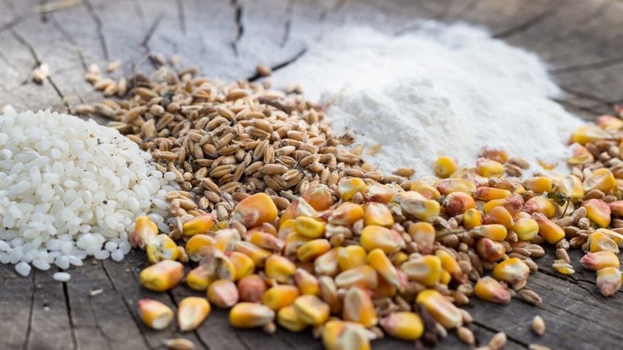 Grains food mix on wooden background