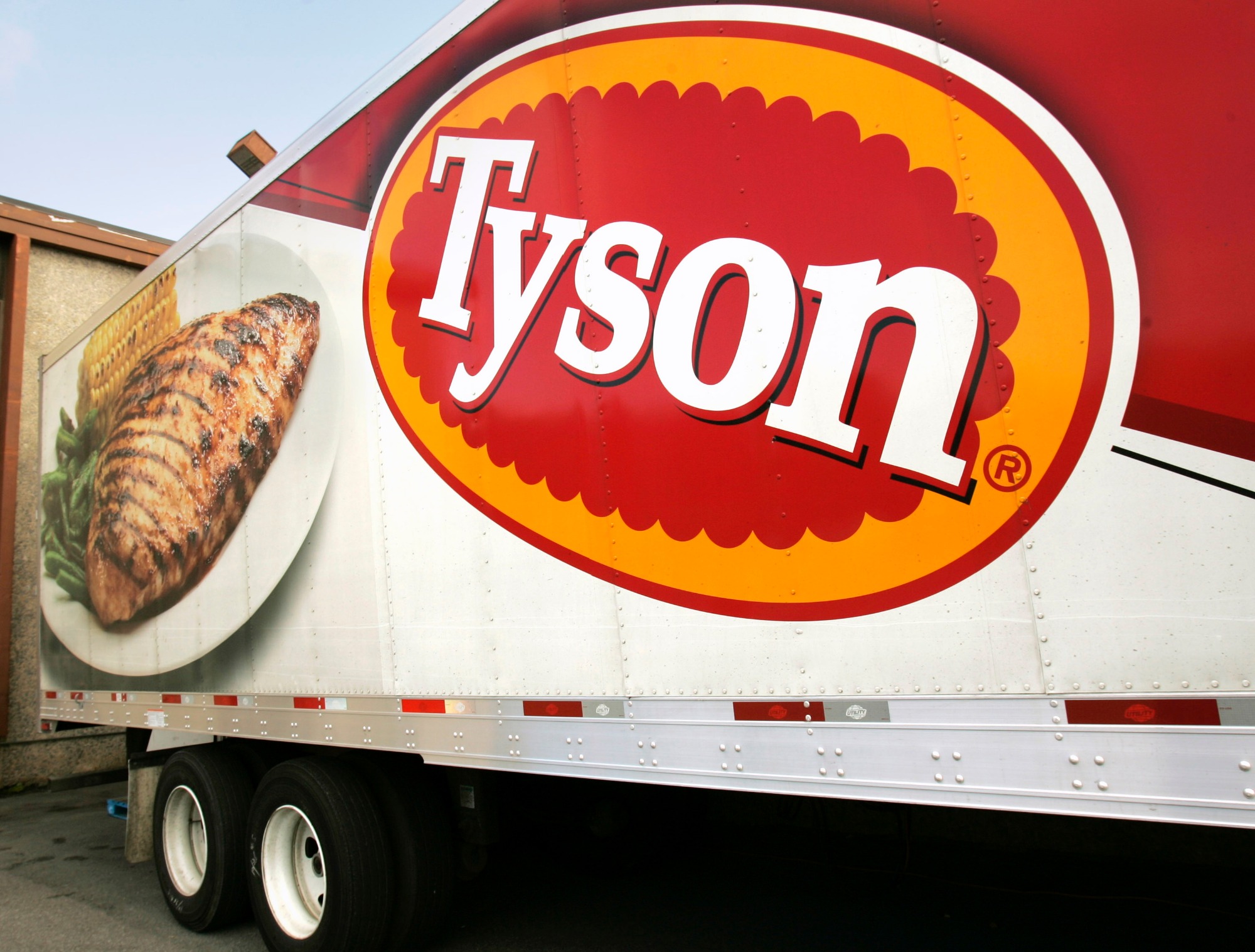 In this photo made Wednesday, Oct. 28, 2009, a Tyson Foods, Inc., truck is parked at a food warehouse in Little Rock, Ark. Tyson Foods, the world's largest meat producer, said Monday, Nov. 23, 2009, it lost money in its fiscal fourth quarter primarily on a hefty goodwill impairment charge.(AP Photo/Danny Johnston)